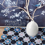 Happiness is Playing with Fabrics